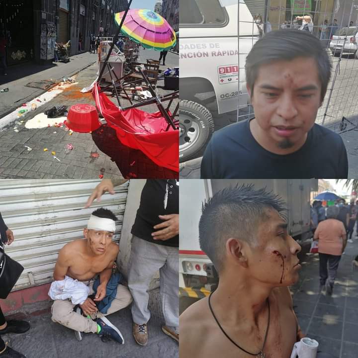 Cinco lesionados, saldo de riña entre ambulantes del Centro de Puebla